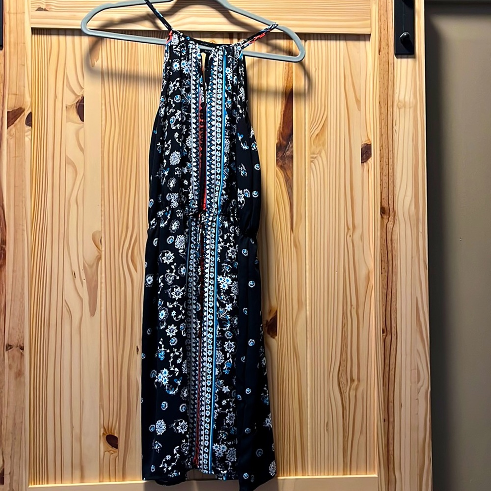 Black dress with orange, teal, and white pattern